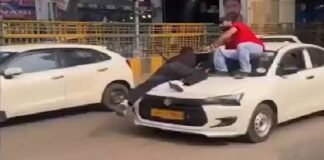नोएडा में बोनट पर दो युवको को लटकाकर सड़क पर दौड़ाई कार, वीडियो वायरल